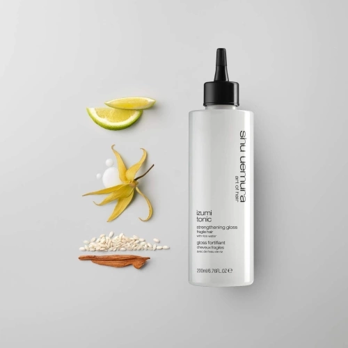 Izumi Tonic Gloss Gloss fortifiant pour cheveux fragiles avec de l'eau de riz 