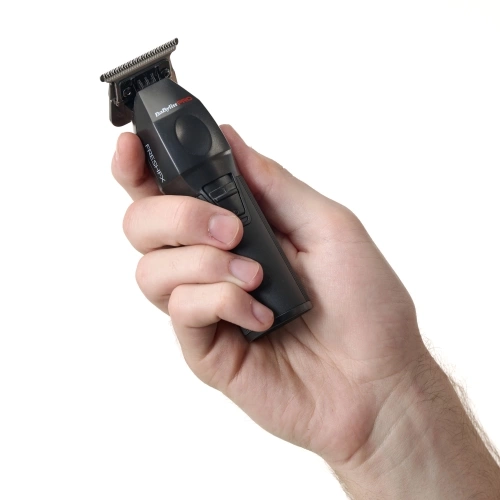 FRESHFX TRIMMER Cordless precision trimmer FX76E FreshFX Trimmer in hand.jpg